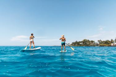 Pair Stand Up Paddleboard in Kailua Bay, off the coast of Kailua-Kona