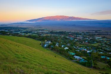 Maunakea at sunset from Hokuula Mountain in Waimea, Island of Hawaii