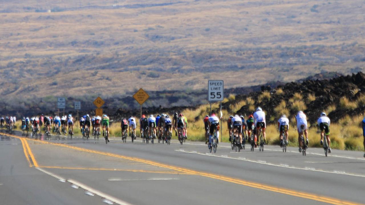 Iron Man cyclers on road