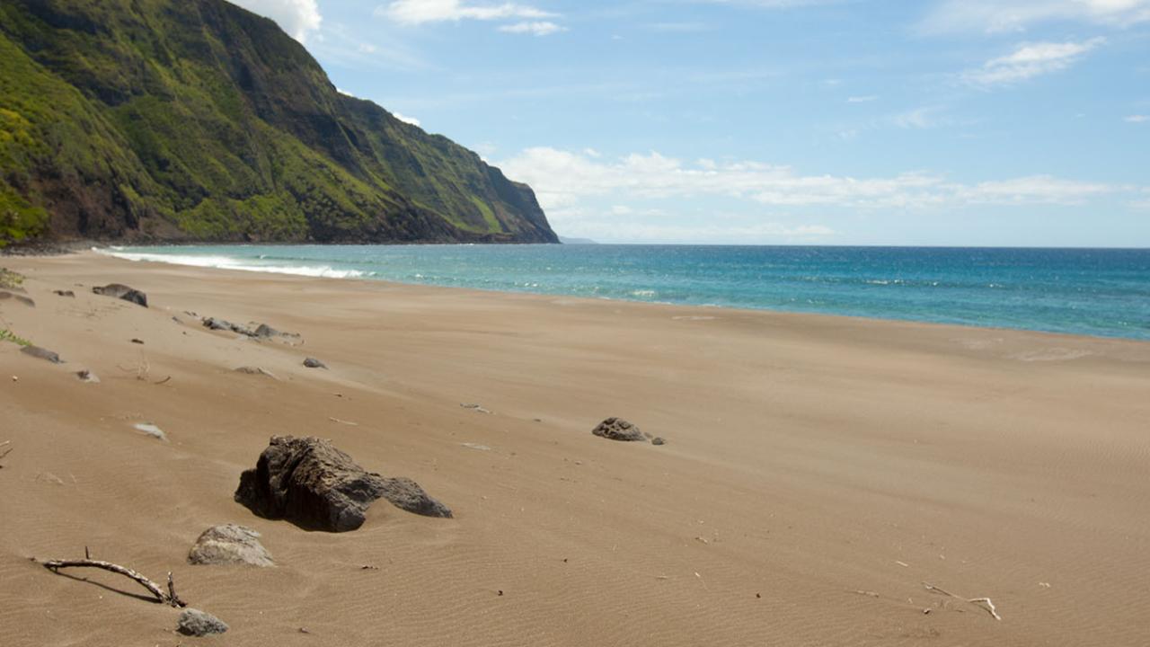 Filming on Molokai beach shot