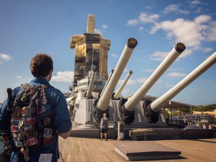 Man looking at Battleship Missouri