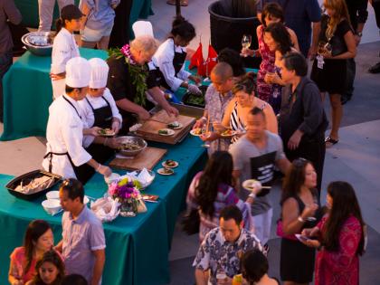 Attendees attend a reception at the Hawaii Convention Center