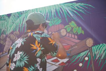 artist painting a mural